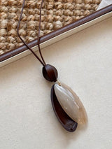 Long Pendant Necklace With Marbled Design
